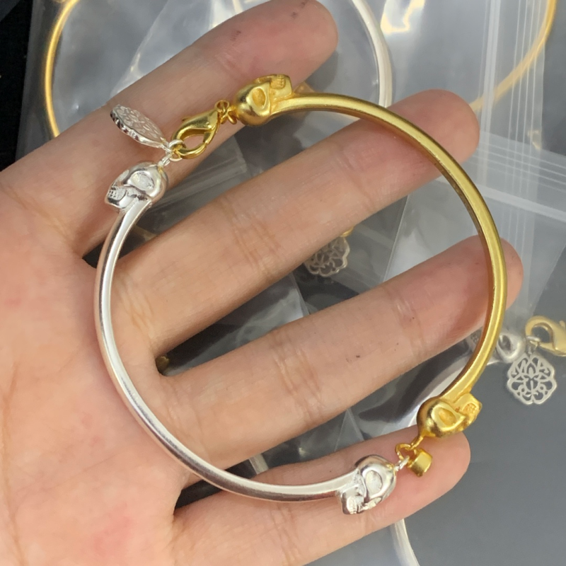 ALEXANDER MCQUEEN EARRING 18K GOLD PLATED Y186127